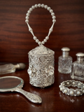 Whispers of the Vanity: Antique Elegance in Silver and Pearl